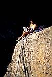 Stock photo of Daniela with laptop computer in climbing scene.